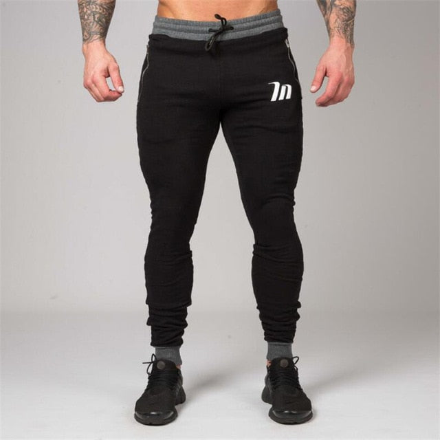 NANSHA Sportswear Gyms Pants Mens Tracksuit Casual Pant Male Fitness Workout Pants Sweatpants Trousers Jogger Pants